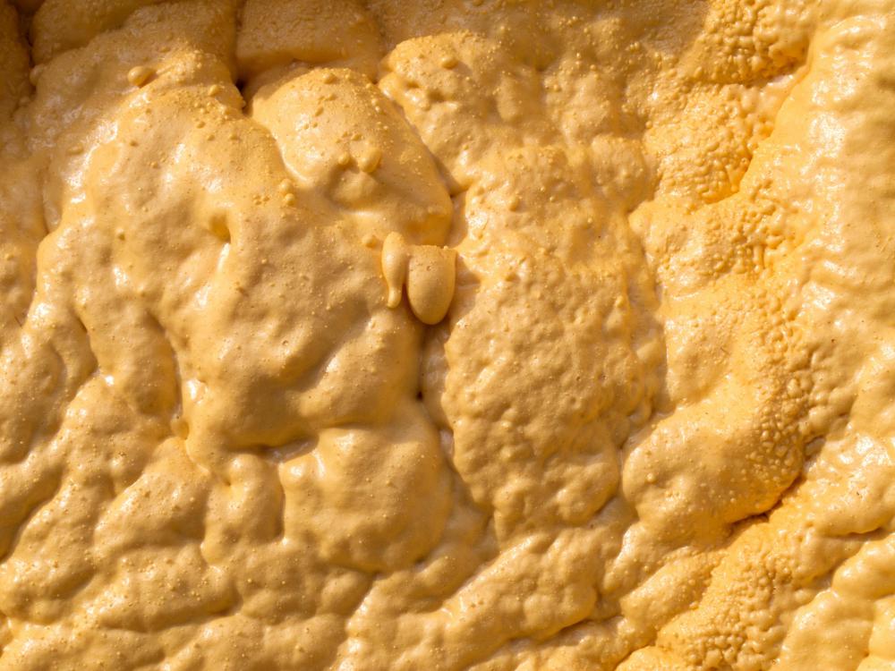 A closeup of spray foam insulation.