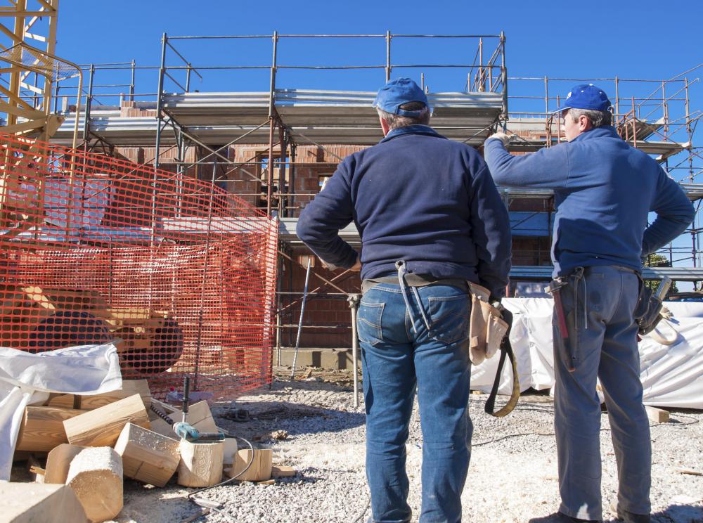 Building permits are not just pieces of paper, but several stages in the process of getting a building "permitted."