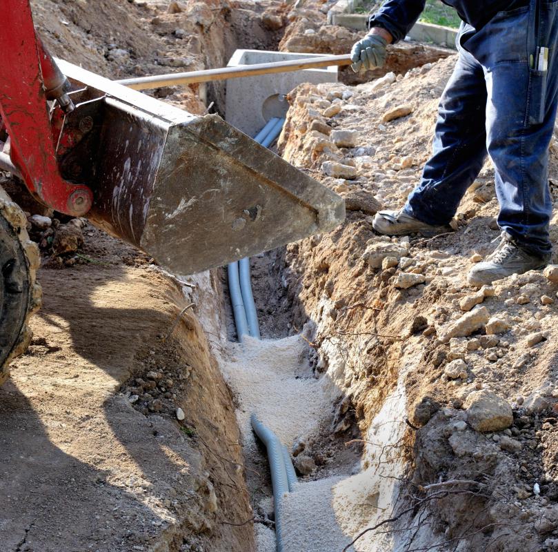 Plot plans typically include the location of underground and overhead utility lines.