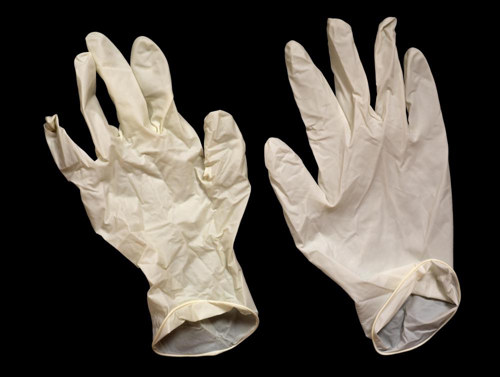 Rubber gloves can protect your hands while killing ants.