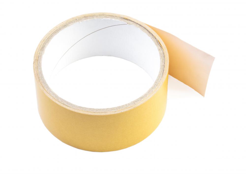 Double-sided carpet tape is often used to keep a rug in place.