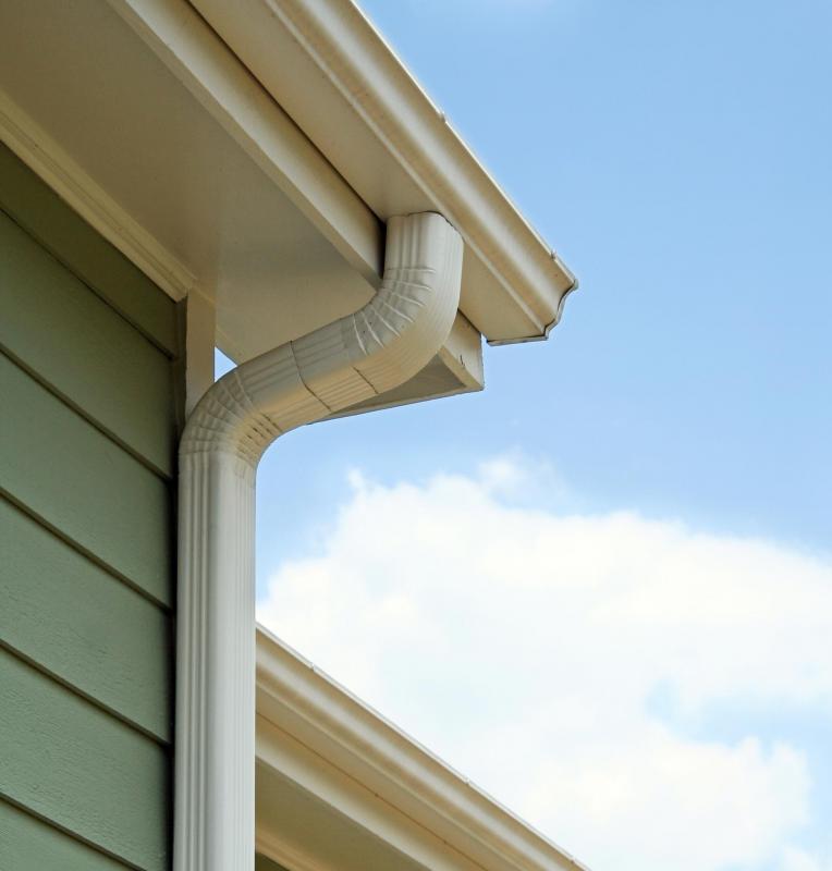 A downspout pulls water away from the gutter system.