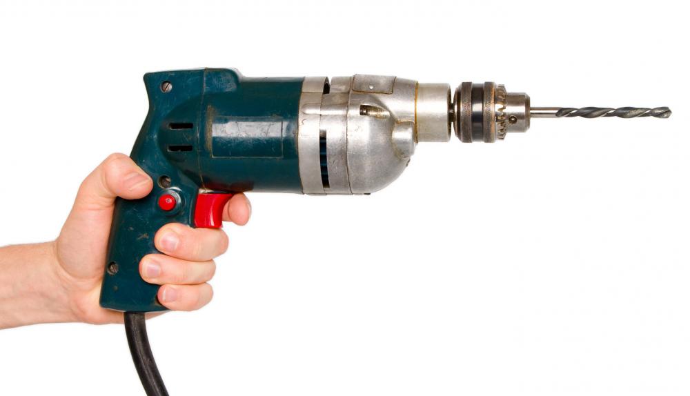 When installing hooks, screws, and anchors into brick, it's critical to work slowly and carefully, and with the proper tools; an electric drill with a carbide masonry bit is required if you are using lead anchors.