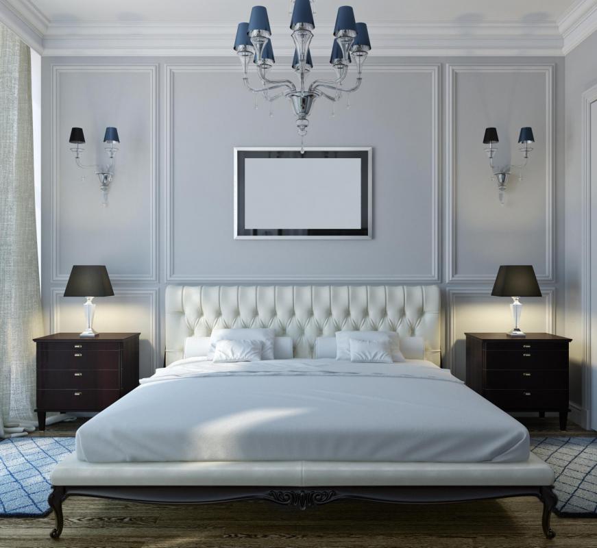Matching nightstands with drawers are often used in symmetrical bedroom layouts.