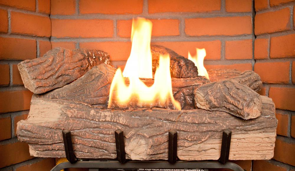 Many prefab fireplaces use gas burning logs instead of actual wooden logs.