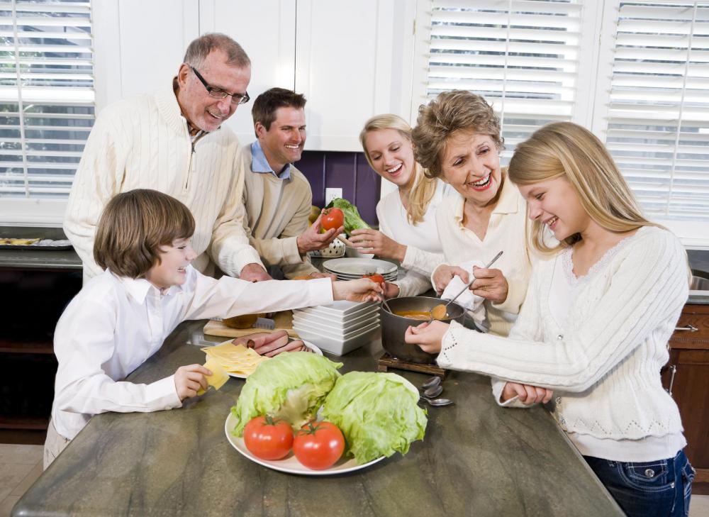 Kitchen islands allow multiple people to utilize countertop space for food preparation at the same time.