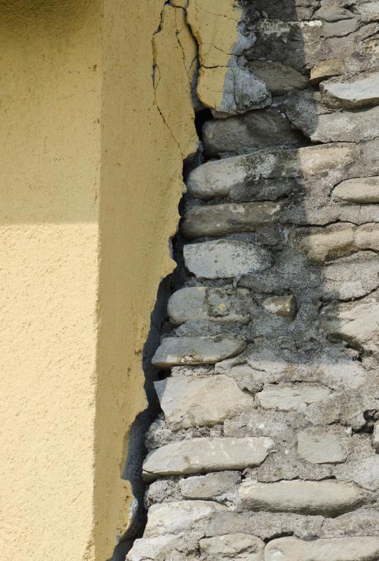 Deep, vertical cracks in exterior walls may indicate serious structural damage.