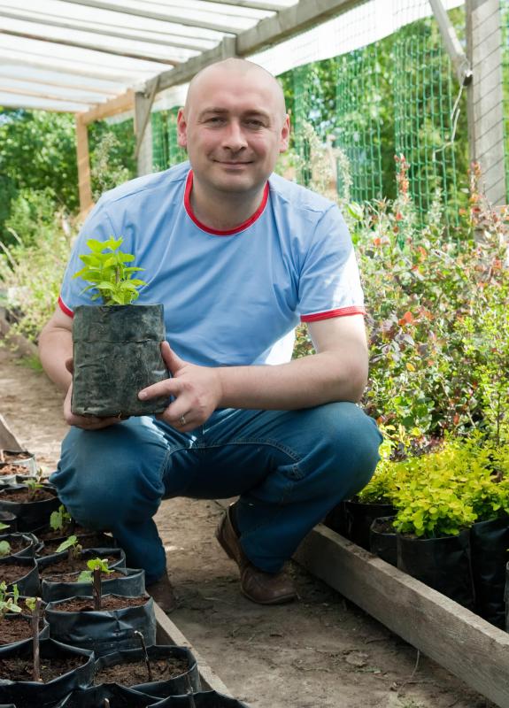 Plants can be grown all year in a greenhouse.