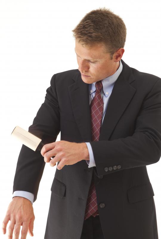 A lint roller can be great for removing unwanted items from an otherwise clean suit.