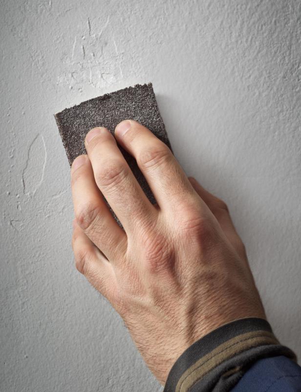 Spackling paste should be sanded down after it dries.