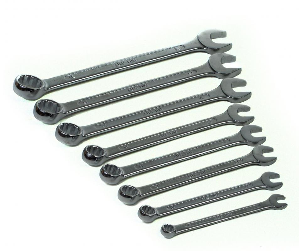 Wrenches -- either box-end or open spanner or both -- are usually used to turn coach screws.