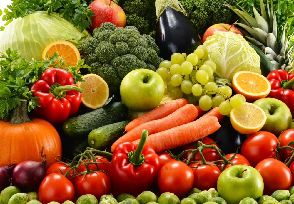 A plant propagator utilizes plant reproduction methods to create new and improved varieties of fruits and vegetables.