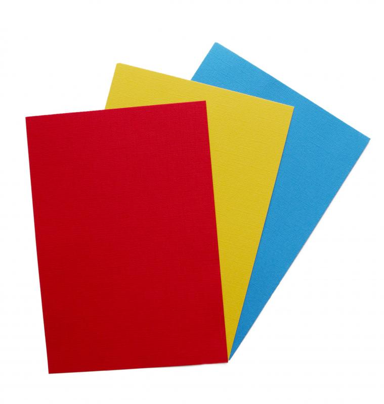 Children sometimes use construction paper when making stick puppets.