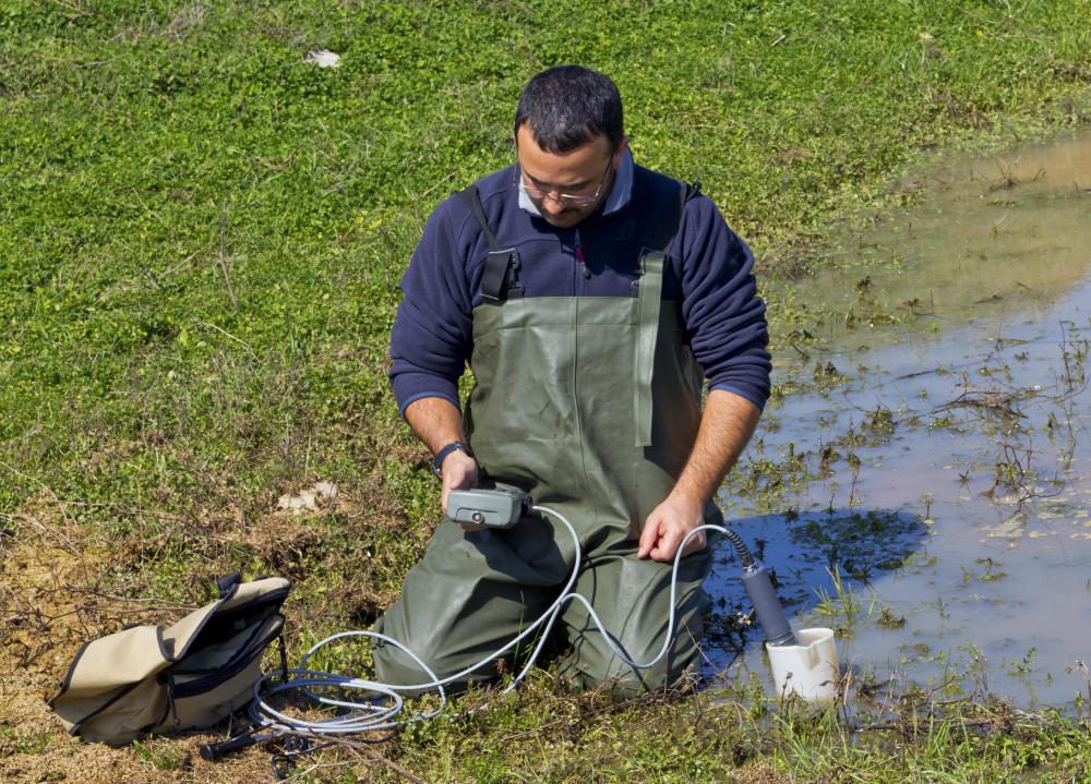A water scientist doing field research.