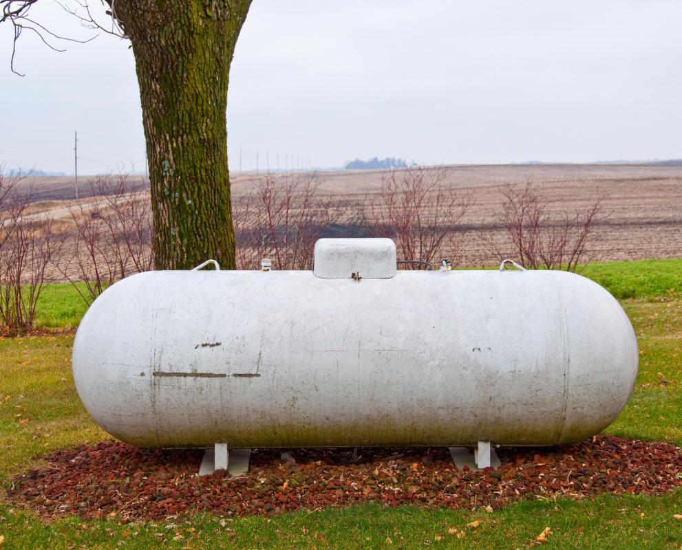 A side view of a residential propane tank.