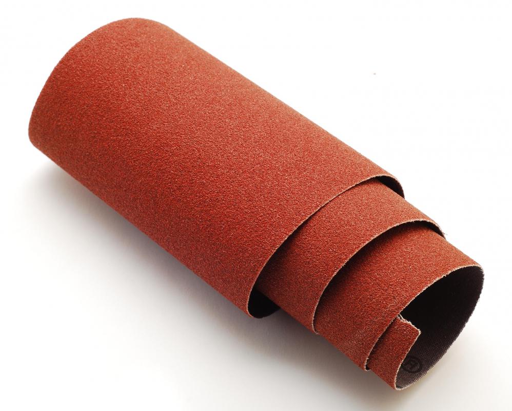 Sandpaper, which can be used to smooth walls after repairing cracks.