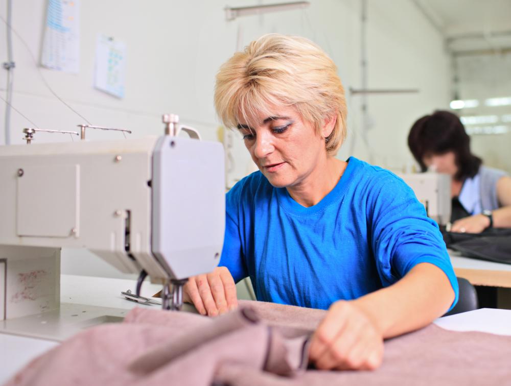 A seamstress making a French seam.