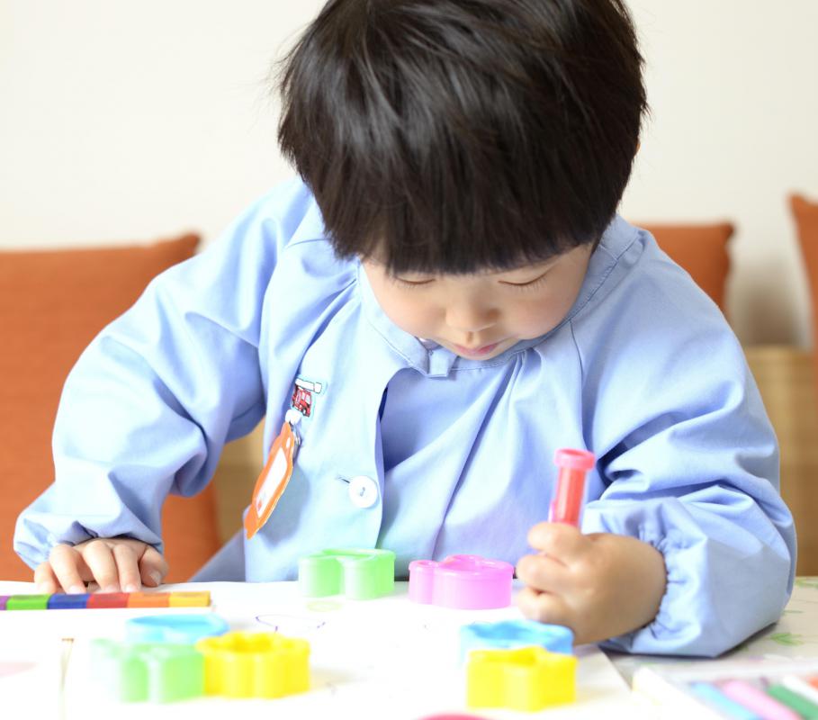 Heavy paper is best for a child playing with washable markers.