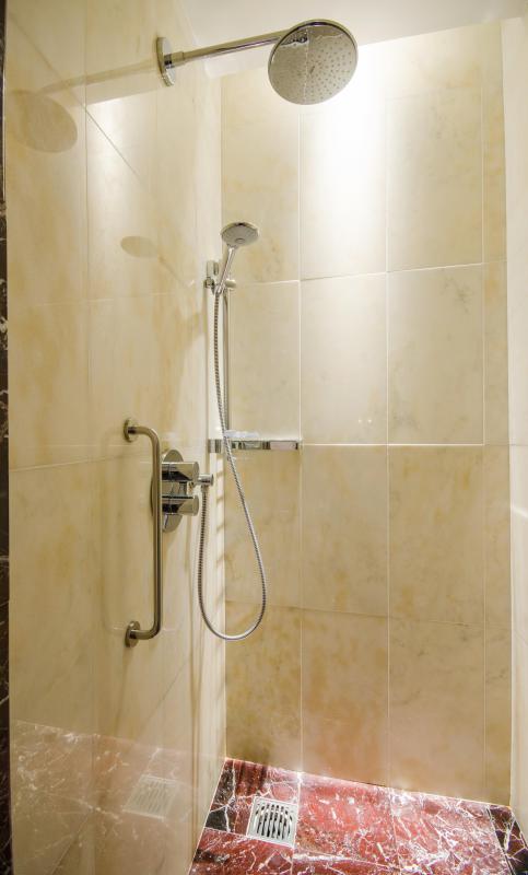 Shower enclosures are typically designed as part of a bathroom's overall aesthetics.