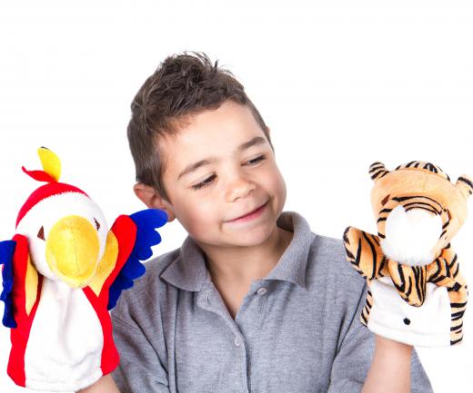 Children can be encouraged to write their own screenplay for a puppet show.