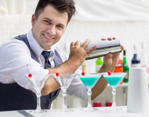 Bartenders may serve signature drinks at a wet bar.
