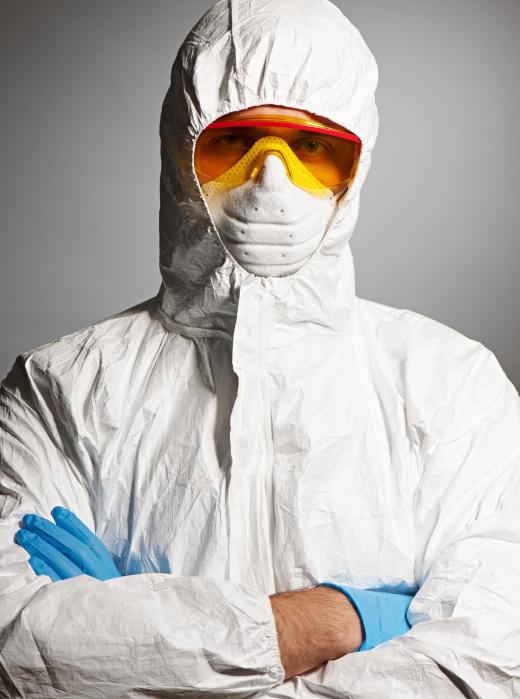 Full-coverage protective garments should be worn when working with asbestos dust.