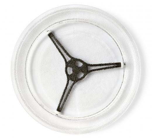 The turntable should be removed prior to resurfacing the inside of a microwave.