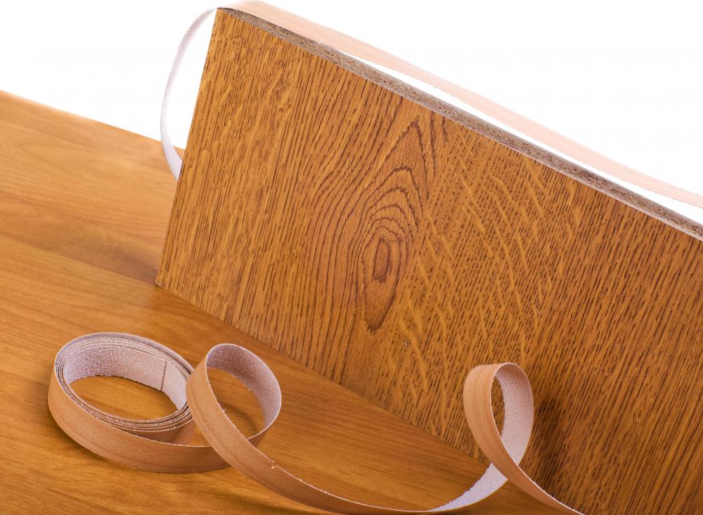Stick on veneer is a quick, affordable way to reface cabinets.
