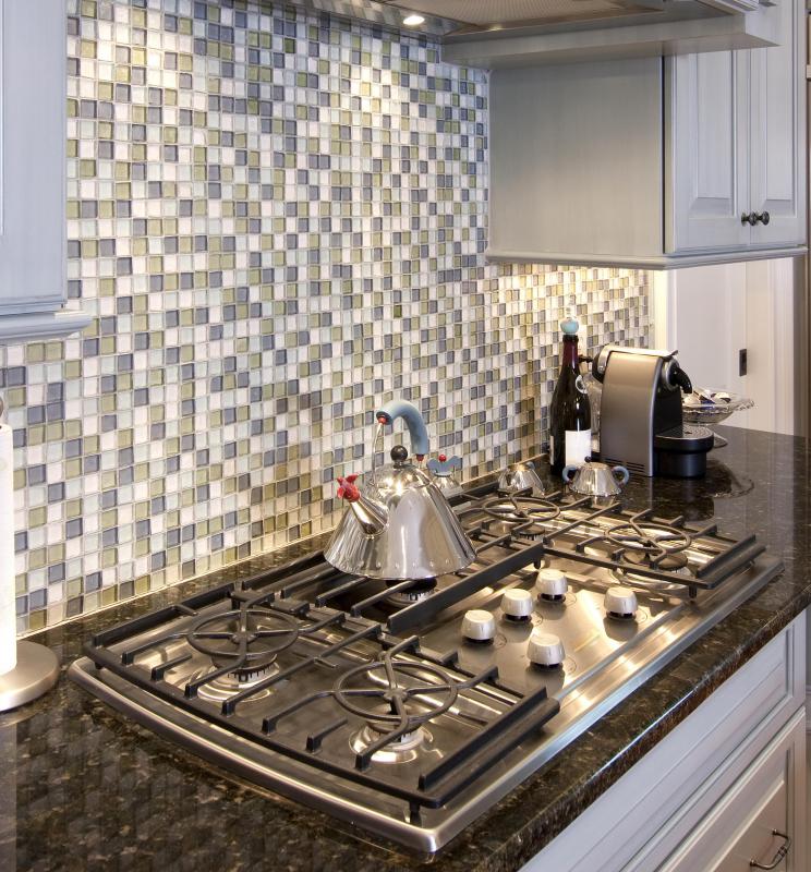 A shiny, tile backsplash works better in a modern kitchen than in a rustic one.