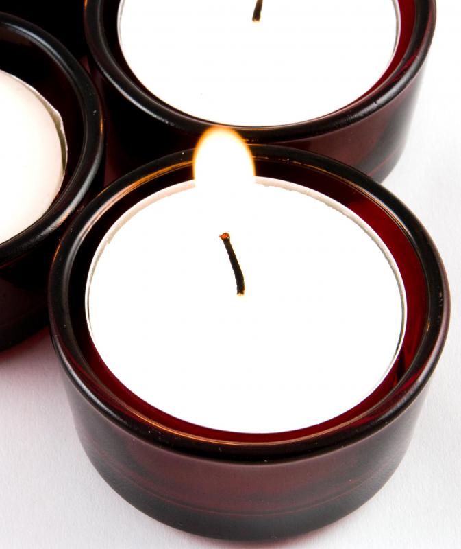 Votive candles may help enhance a tablescape’s overall ambiance.
