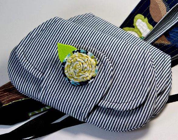 A purse made of ticking.