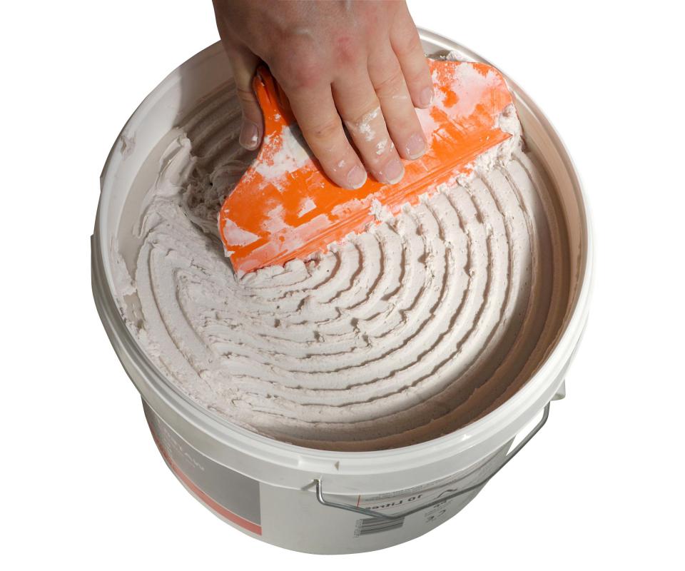 Organic mastics come premixed and is sufficient for most tile projects.
