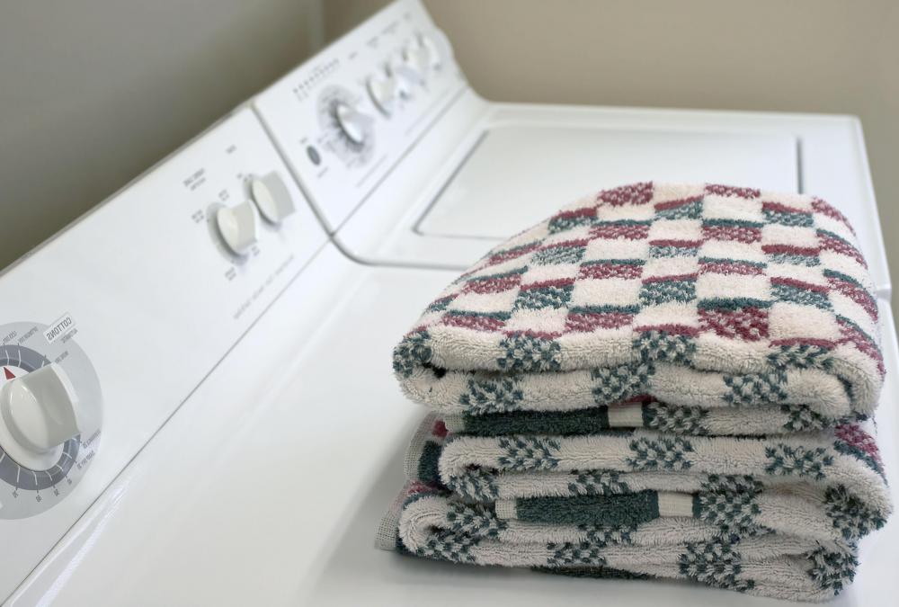 A washer and dryer may be featured in a mud room.