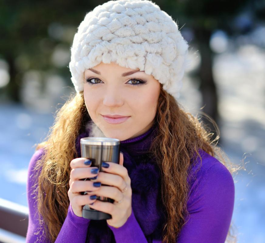 A travel mug may be used to store hot chocolate.