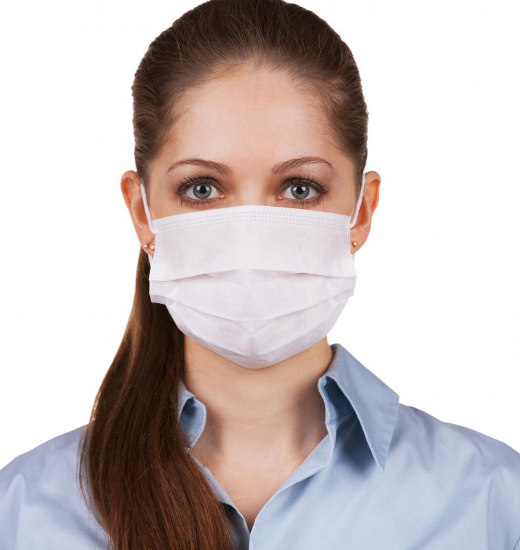 People performing grout removal should always wear a face mask.