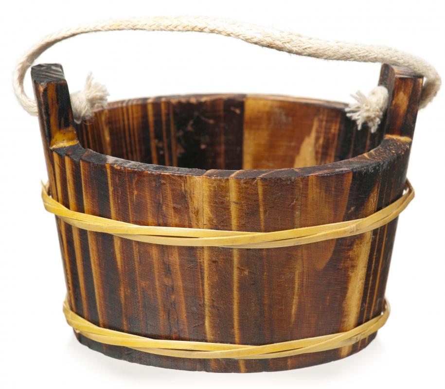 Flood irrigation used to be accomplished by individuals transporting buckets of water to a field.