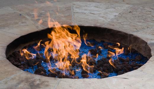 An in-ground fire pit.