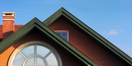 An attic truss is typically used to support a peaked roof.