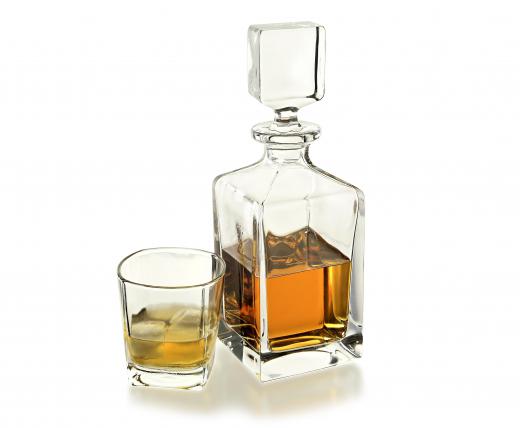 Tuscan home decor can sometimes include a whiskey decanter or flask.