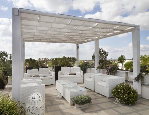 A patio canopy extends over the patio providing shade and/or protection from the elements.