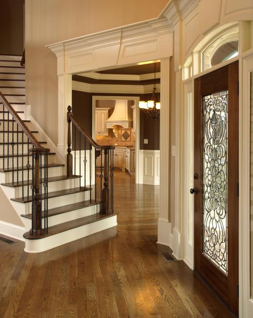 A foyer separates the front door from the main portions of the house.