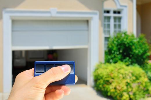 A garage door is often controlled by an inside switch that can be activated with a remote control.