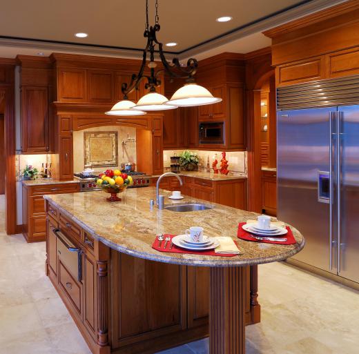 Granite countertops are a durable and elegant feature for a gourmet kitchen.