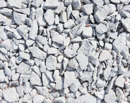 Crushed gravel is frequently used to fill driveways and drainage areas.