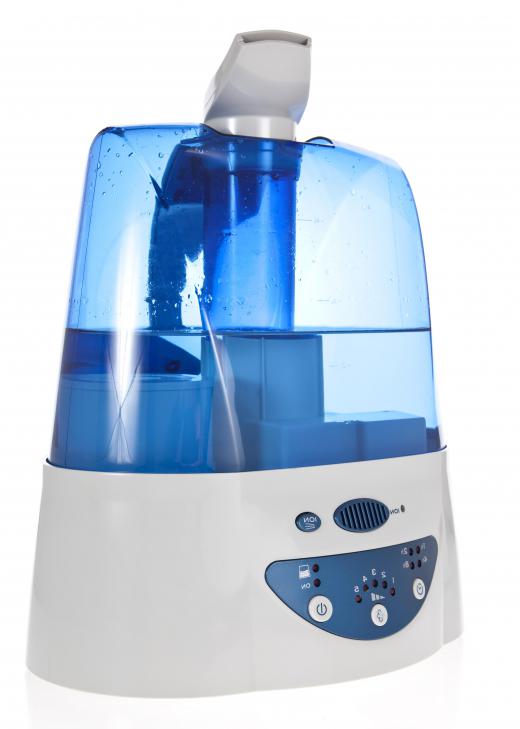 A cool mist vaporizer emits water vapor, producing moisture.