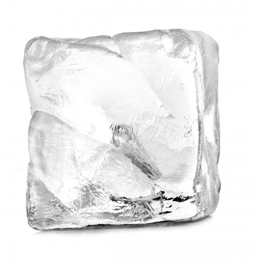 An ice cube can be used to remove glue from carpet.