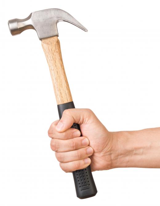 A hammer can be used to pound loose nails back into position.