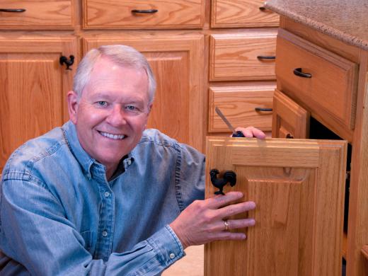 Many homeowners paint or stain the cabinet faces themselves.