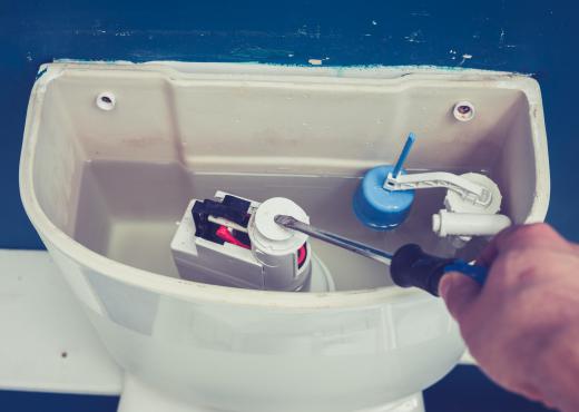 A toilet utilizes a cistern to hold the amount of water necessary to flush the toilet.