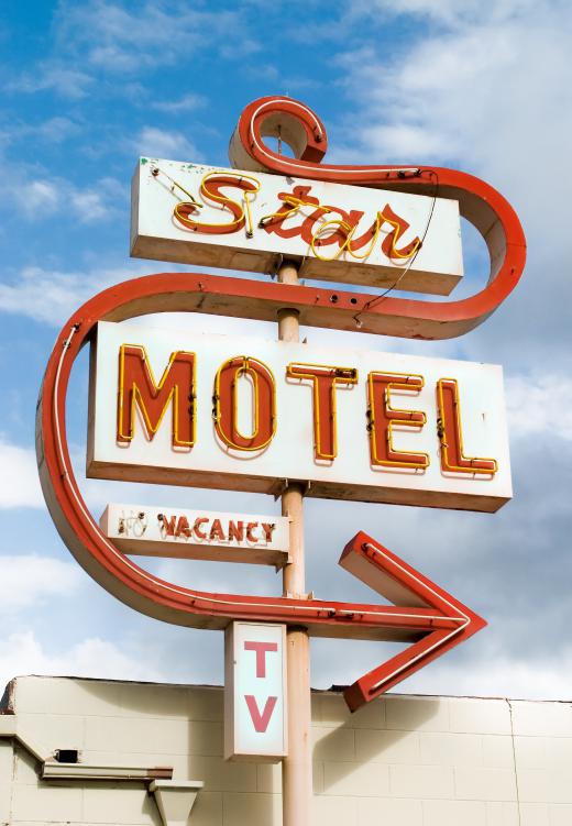 Motel rooms often have corner showers.